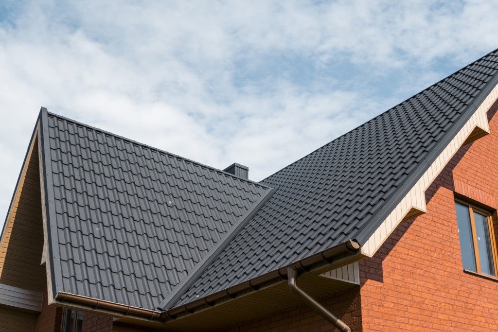 modern roof covered with tile effect pvc coated brown metal roof sheets